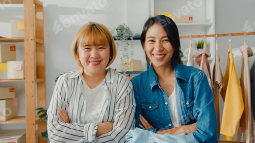 Preview: Portrait of young Asia women fashion designer feeling happy smile, looking to camera.