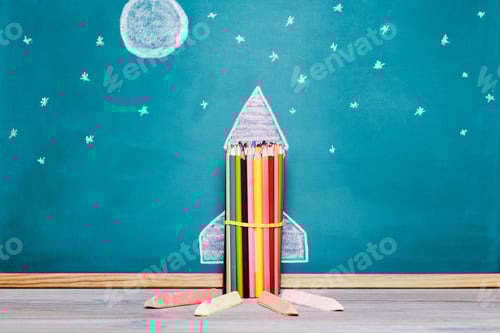 Preview: rocket made with crayons and drawn on a blackboard