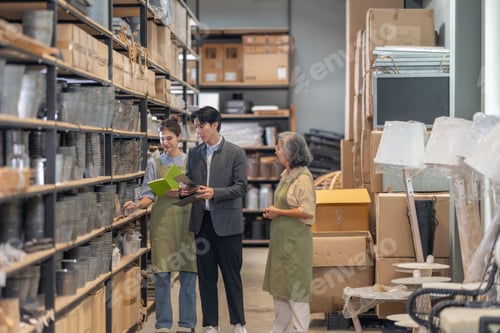 Preview: Asian Male Investor Touring Family-Run Ceramic Warehouse for Partnership Deal