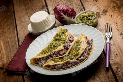 Preview: pesto crepes filled with ricotta and chicory