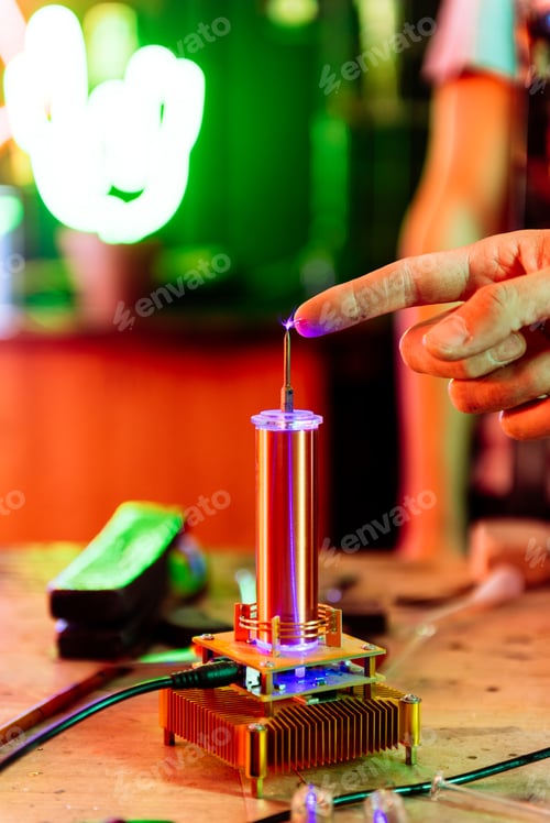 Preview: Close-Up of a Finger Near a Tesla Coil, Demonstrating Electrical Discharge