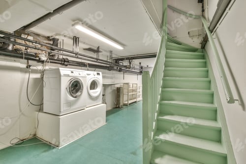 Preview: Washing Machines and Green Staircase in Basement Room