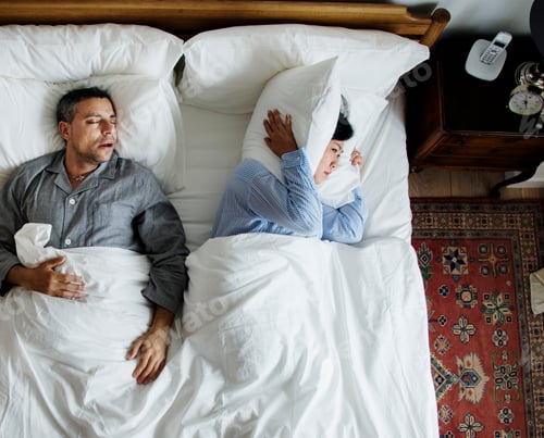 Preview: Interracial couple on the bed man snoring and disrupting woman