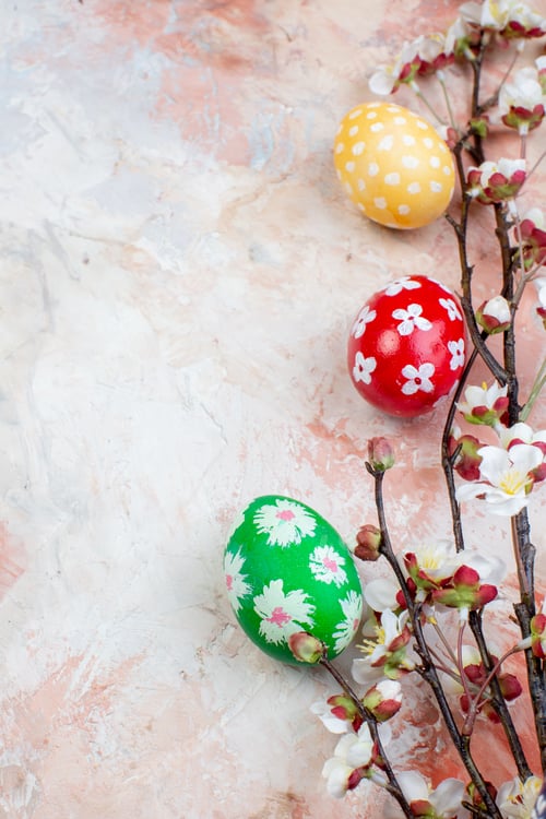 Preview: top view colored easter eggs on light background ornate horizontal colourful spring concept
