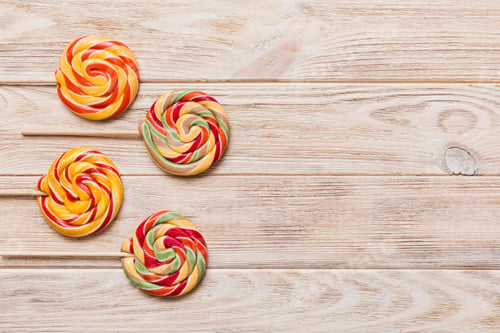 Preview: Set of colorful lollipops on colored background. Summer concept. Party Happy Birthday