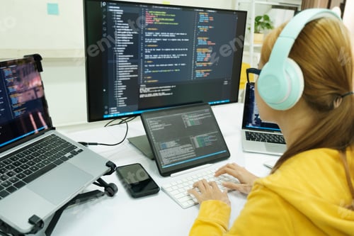 Preview: Programmer is coding and programming software.