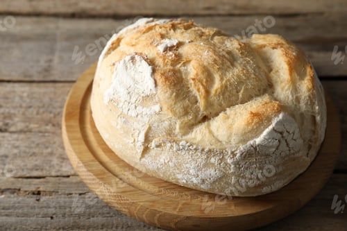 Preview: Freshly baked sourdough bread on wooden table