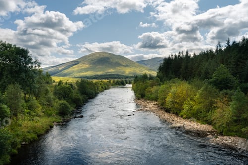 Preview: River flowing through the trees and mountains in Scotland