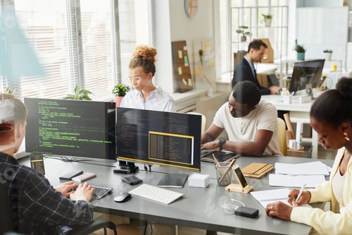 Preview: Programmers working at office of IT company