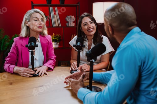 Preview: Content creators broadcasting live podcast interview using microphones