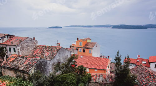 Preview: Beautiful view of the ancient city, the island and the sea on which the ship sails. Rovinj, Istria