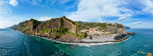 Preview: Ponta do Sol in Madeira Island, Portugal. Aerial drone view at cityscape of coastal town and beach