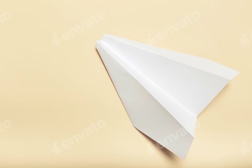 Preview: Blank paper on top of pink pastel desk