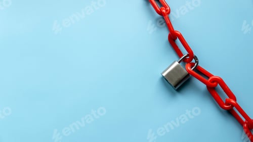 Preview: Safety concept. Red chain and padlock on blue background. Copy space.