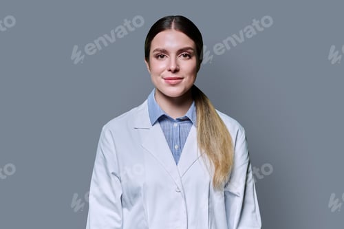 Preview: Woman Wearing White Coat Smiling Portrait