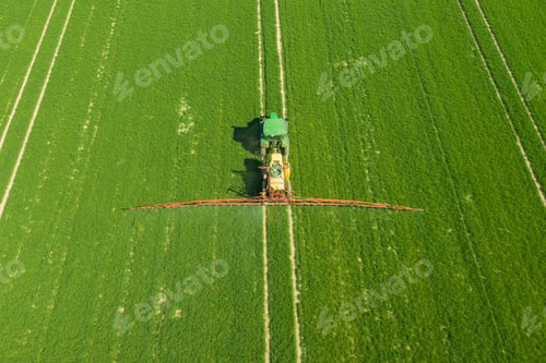 Preview: Agriculture Tractor Working in Field