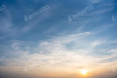 Preview: Dramatic cloudy sky and bright sunrise or sunset over the horizon. Natural skyscape background