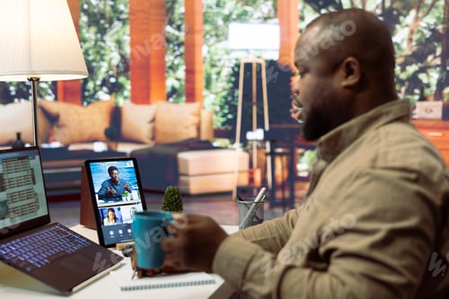 Preview: Businessman analyzing financial statistics and discussing budget allocations