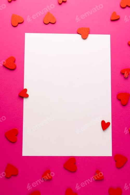 Preview: Vertical white rectangular copy space with red heart shapes on pink background