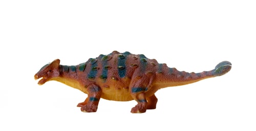 Preview: Detailed toy replica of a colorful ankylosaurus dinosaur isolated on a white background