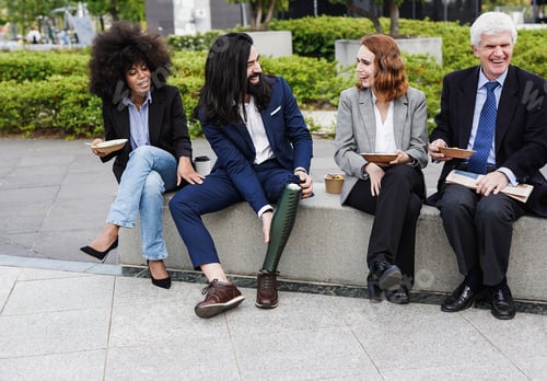 Preview: Multi generational business people sitting outdoor and enjoy healthy lunch