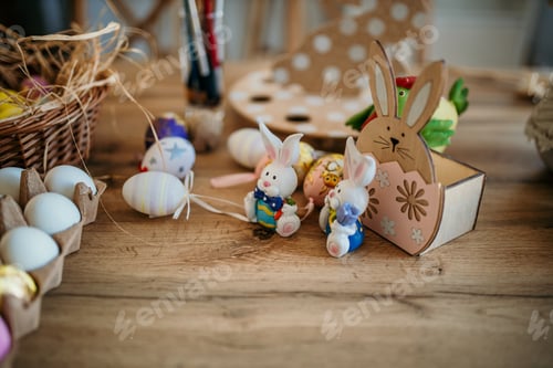 Preview: Easter spring decorations arranging on wooden surface