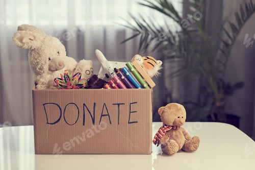 Preview: Donation box with children toys. woman collects toys for charity.