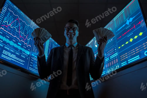 Preview: The smiling businessman holding currency in his hands