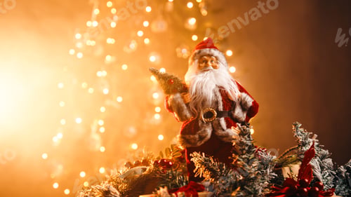 Preview: Rotating miniature of Santa Claus toy against the tree in Christmas