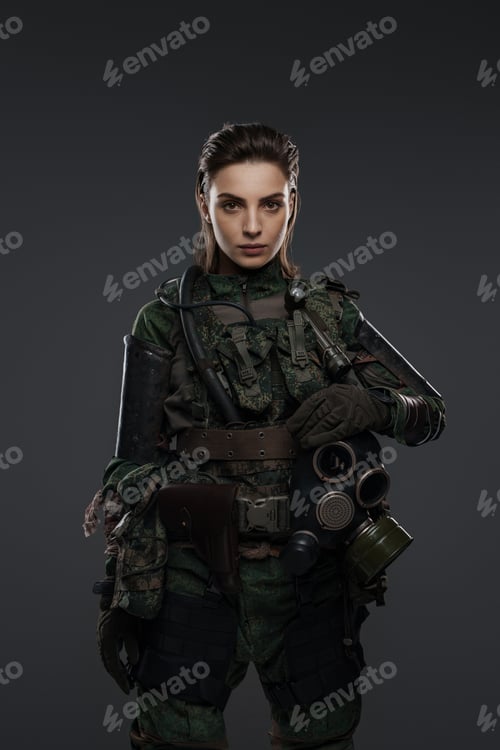 Preview: Portrait of a woman in military attire against a gray background