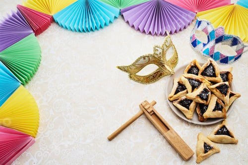 Preview: Purim Festive Setup. Colorful Purim scene with masks,