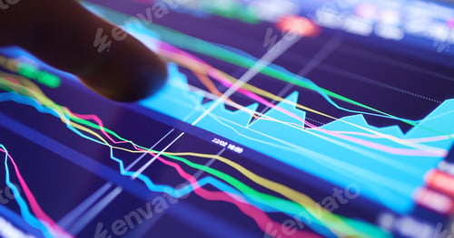 Preview: Working on digital tablet with stock market graph