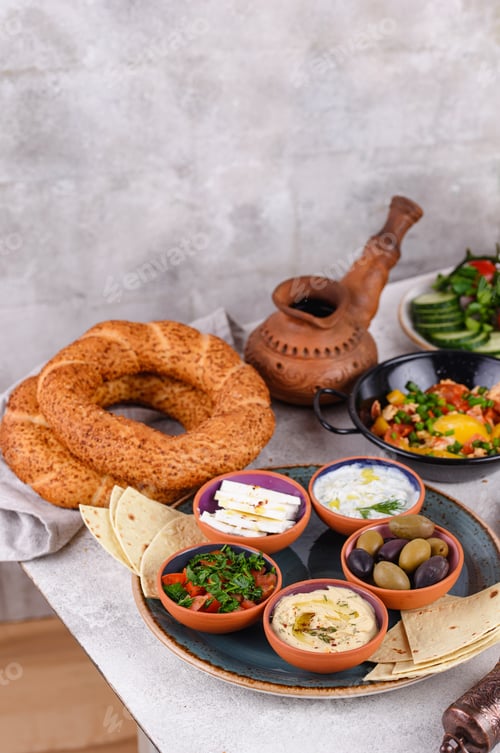 Preview: Traditional Turkish breakfast with meze and simit