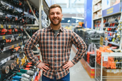 Preview: Young man working in hardware store