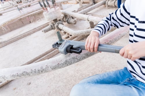 Preview: Children using a heavy-duty straight pipe plumbing wrench to repair a pipe.
