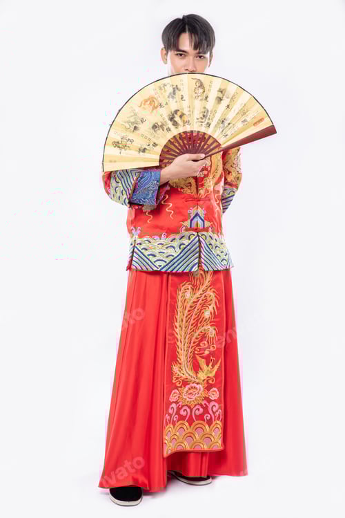 Preview: Man wear Cheongsam suit show the chinese hand fan on big event in chinese new year