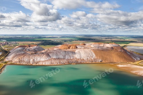 Preview: Mountains of products for the production of potash salt and artificial turquoise reservoirs.Salt