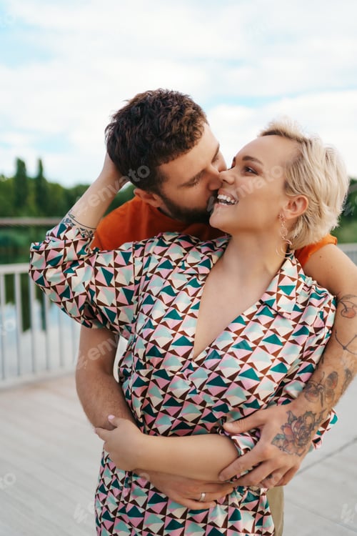 Preview: Portrait happy couple hugging