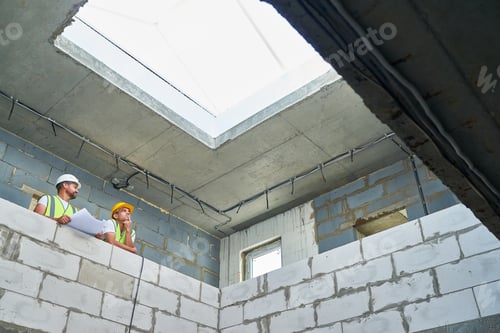 Preview: Two Builders on Construction Site