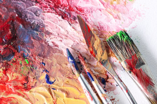Preview: Abstract colorful artwork and brushes, closeup view
