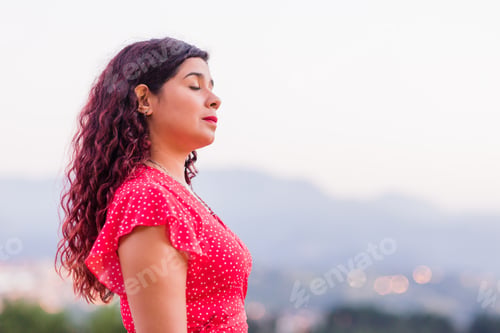 Preview: latin people portrait. lifestyle young good-looking woman outside. Calming happiness of Venezuelan