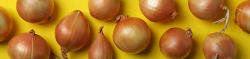 Preview: Flat lay with fresh ripe onion on yellow background