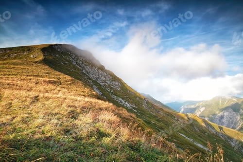 Preview: mountain over blue sky during sunny day