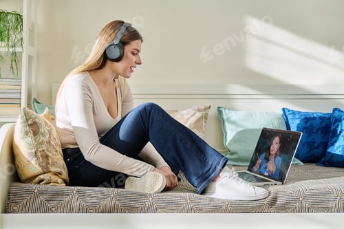 Preview: Young woman studying online, student having video call with teacher