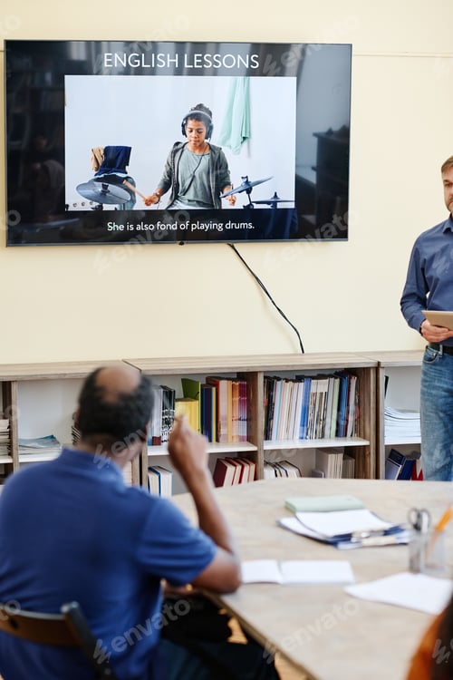 Preview: Students Watching Presentation On Screen