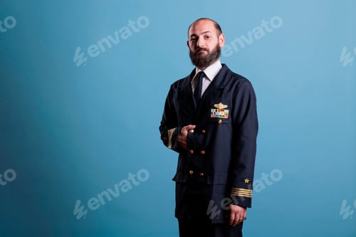 Preview: Airplane pilot wearing uniform portrait