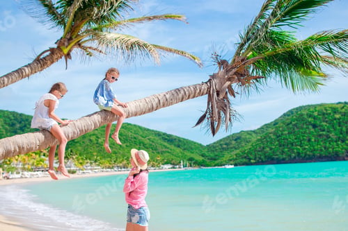 Preview: Young family on vacation have a lot of fun on palmtree