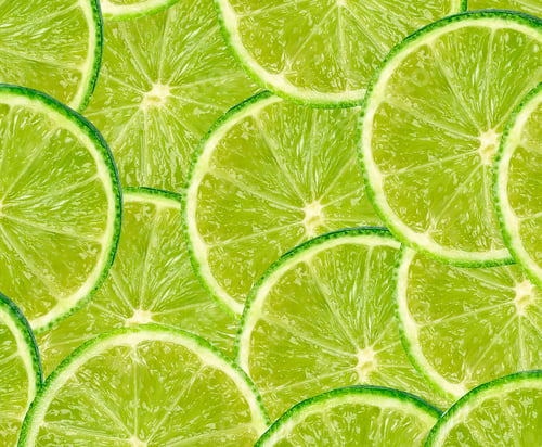Preview: Limes with slices close up background