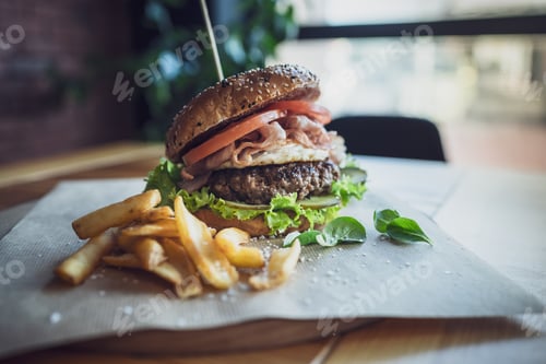 Preview: Beef Egg and Bacon Burger Served in Restaurant. American Food. Tasty Gourmet on Wooden Table