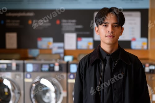 Preview: Portrait of man in laundry shop